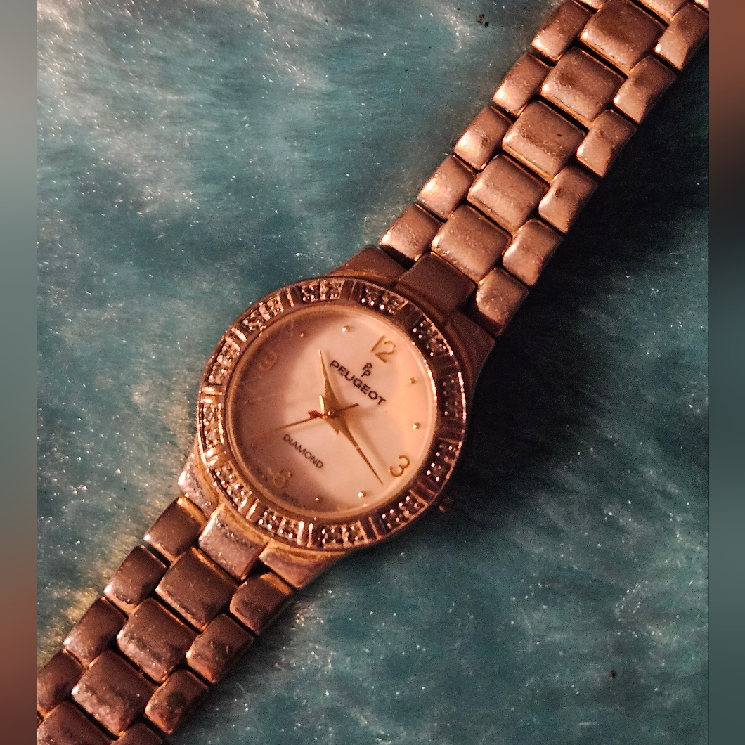 Peugeot Silver Watch With Diamond Accents